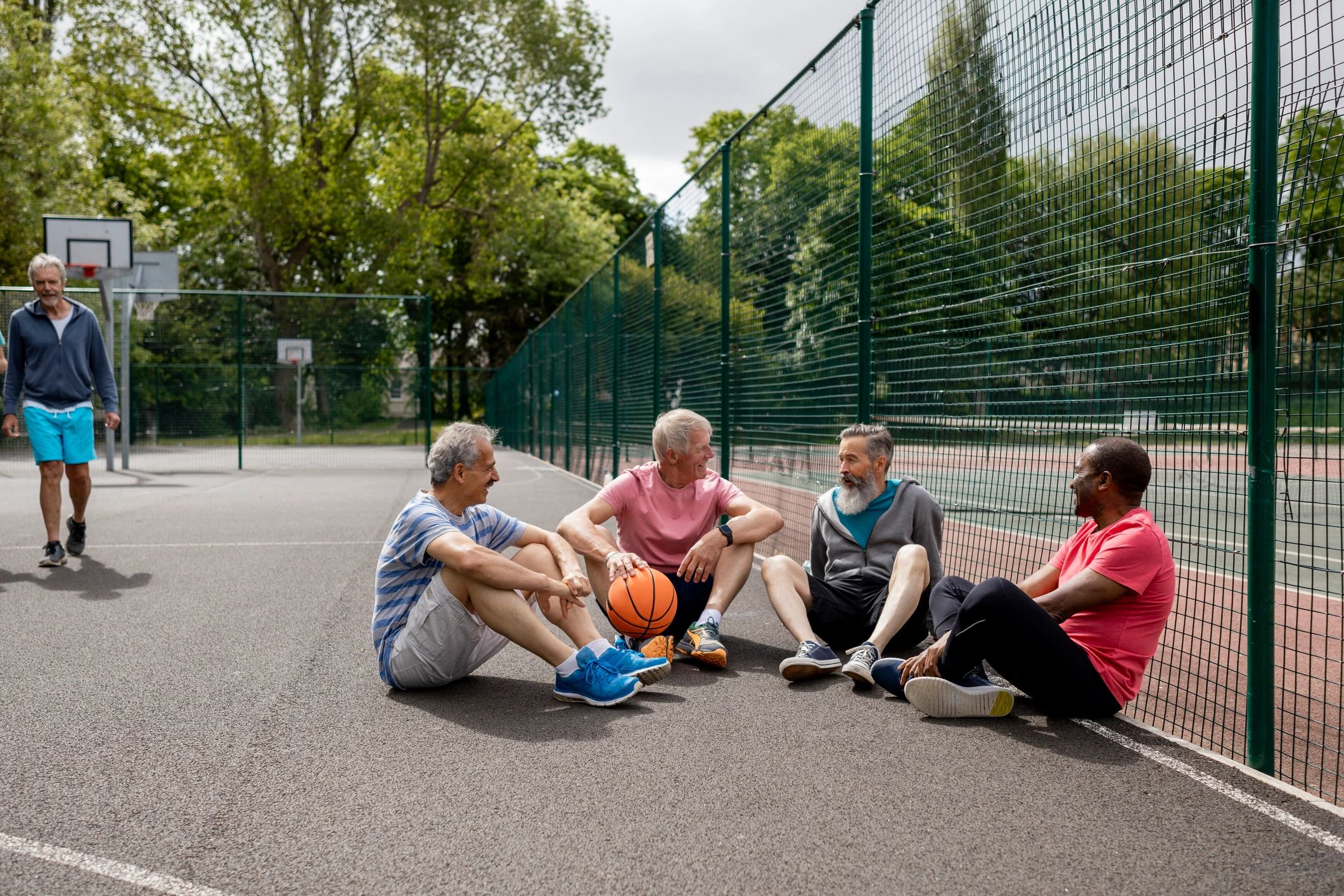 Community members taking a break and talking together outdoors